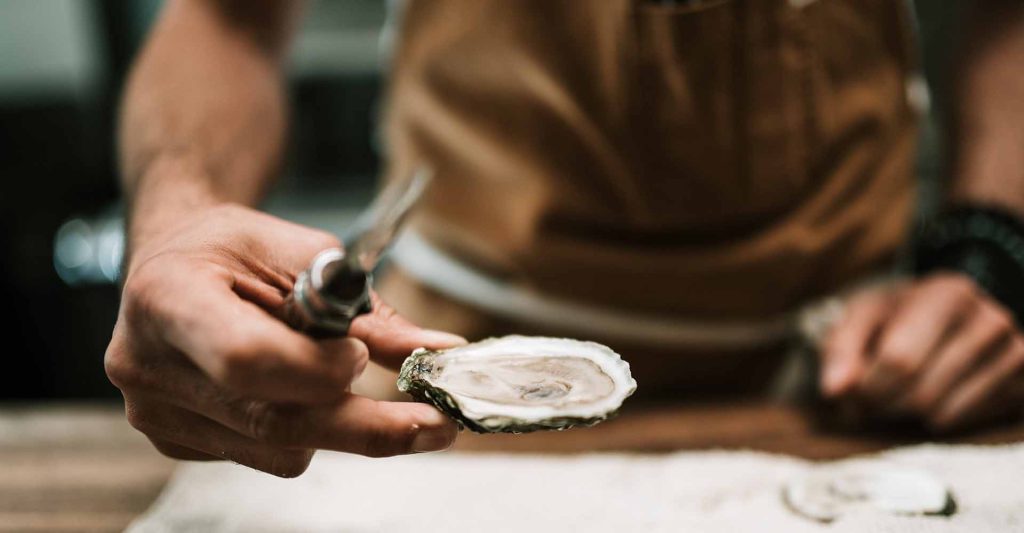 Oyster shucking